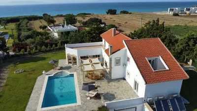 an aerial view of a house with a swimming pool at Villa Eos in Kalavárda