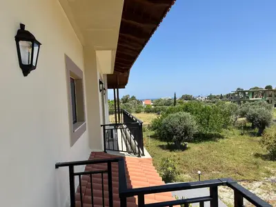 a view from the balcony of a house at Katalyma Vouno in Ialyssos