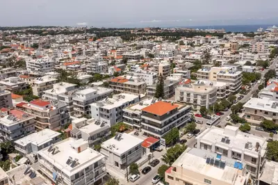 an aerial view of a city with white buildings at Casadi City Apartment in Rhodes Town