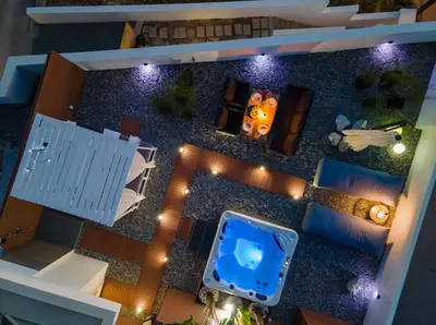 an overhead view of a living room with a pool at Sunny Nest Apartments in Ixia
