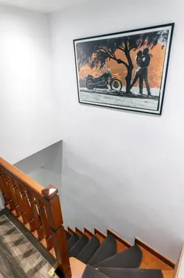 a picture of a motorcycle hanging on a wall at Casa Aurora Rhodes in Rhodes Town