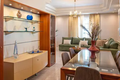 a living room with a table and a couch at Maio Seaview & Sunset Stay in Kremasti Rhodes in Kremasti