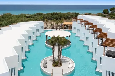 an aerial view of the infinity pool at the resort at Martini Boutique Resort in Ialyssos