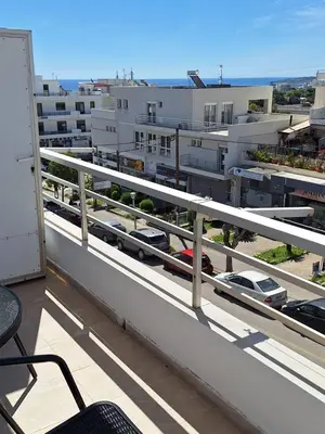 a balcony with a view of a building at EFReMIAS PLACE in Rhodes Town