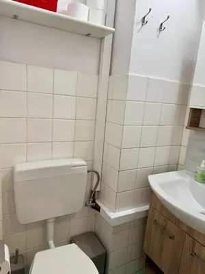 a bathroom with a toilet and a sink at Polikseni Apartment Orfanidou in Rhodes Town