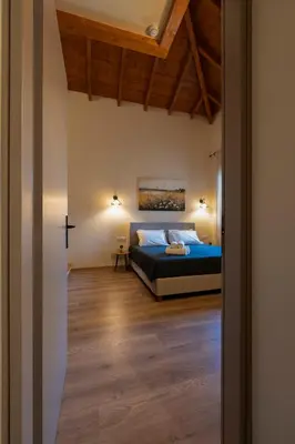 a bedroom with a bed in a room at Eviona Iris in Rhodes Town