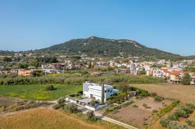 an aerial view of a town on a hill at Filerimos Panorama Villa in Pastida