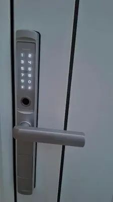 a remote control is sitting on a shelf at MariAnthi Apartment in Kremasti