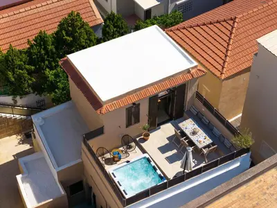 an overhead view of a house with a swimming pool at Rodos Aqua Luxury Villa in Rhodes Town