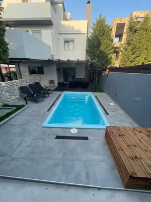 a swimming pool in the backyard of a house at Casa del Emma in Koskinou in Koskinou