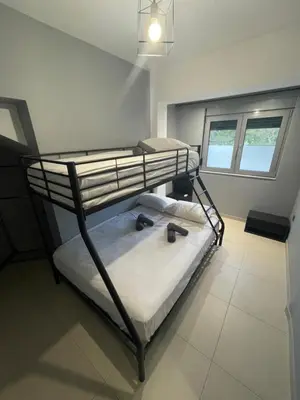 a bedroom with a bunk bed in a room at Casa del Emma in Koskinou in Koskinou