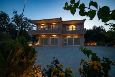 a house with a large driveway in front of it at Casa Serena in Lardos