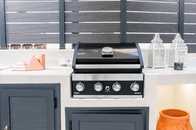 a kitchen with a stove top oven on a counter at NiMar luxury city villa with jacuzzi in Rhodes Town