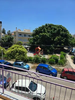 a group of cars parked in a parking lot at City Central Appartment in Rhodes Town