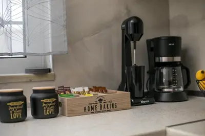 a kitchen counter with a box of home king coffee at Casa Platoni in Apolakkiá