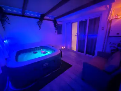 a room with a jacuzzi tub in a living room at My Summerhouse with jacuzzi in Kremasti