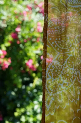 a close up of a curtain with flowers on it at Hotel Ellique in Rhodes Town