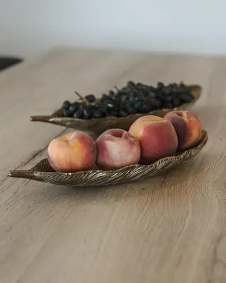 two baskets of fruit sitting on a table at Pura Vida Beach House in Kiotari