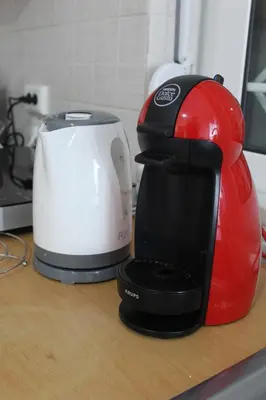 a coffee maker and a toaster sitting on a counter at Melpos Room in Kremasti