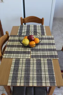 a bowl of fruit sitting on top of a table at Melpos Room in Kremasti