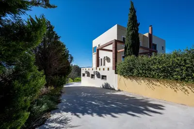 a house with a road in front of it at Mayas Boutique Greece Rhodes Kremasti in Kremasti