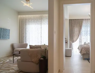 a living room with a couch and a bed at Casa di Anna Seaside in Rhodes Town