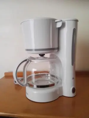 a food processor sitting on top of a table at Bouganville Studios Stegna in Archangelos