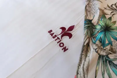 a picture of a woman with a tattoo on her arm at Bastion Luxury Medieval Accommodation in Rhodes Town