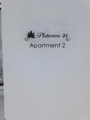 a sign that reads platinum apartment at Platanou 21 Apartments in Kremasti