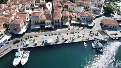 an aerial view of a harbor with boats in the water at Charistella Apartment in Symi