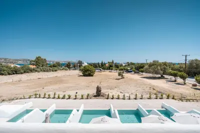 a view of the pool from the roof of a house at Kathara bay Studios in Faliraki