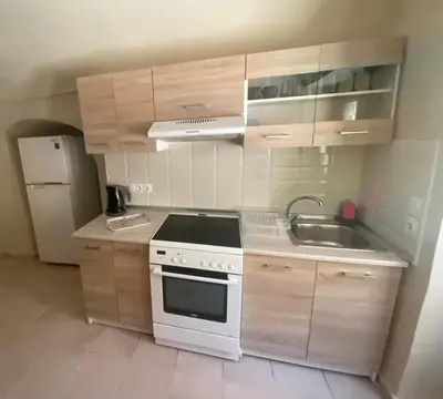 a small kitchen with a stove and a sink at Liora in Rhodes Town