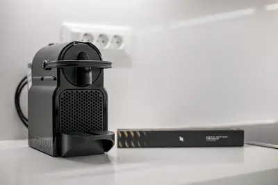 a hair dryer sitting on top of a counter at Vasi Luxury Apartment in Rhodes Town