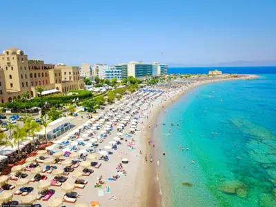 an overhead view of a beach with people and umbrellas at Antony's Elli beach home in Rhodes Town