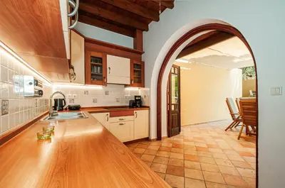 an arched kitchen with an archway in the middle of it at Harmonia - A Sanctuary in the Old Town of Rhodes in Rhodes Town