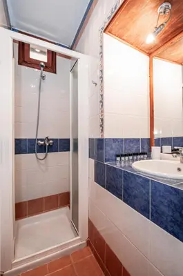 a bathroom with a shower and a sink at Harmonia - A Sanctuary in the Old Town of Rhodes in Rhodes Town