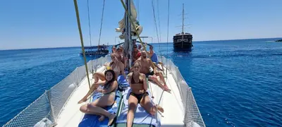 a group of girls on a boat in the water at Sailing Edisa Rhodes Adventures in Rhodes Town