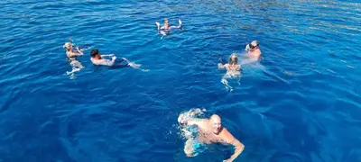a group of people swimming in the water at Sailing Edisa Rhodes Adventures in Rhodes Town
