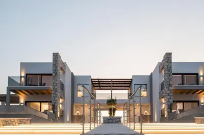 a rendering of a building with a palm tree in front at Blue Sunrise Villa 1 in Afantou