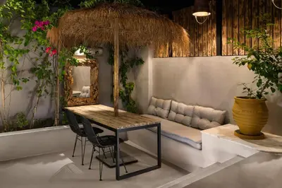 a table with chairs and a table with a mirror at Elakati Luxury Boutique Hotel - Adults Only in Rhodes Town