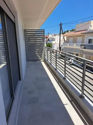 a balcony with a view of the city at Giannis Apartment in Afantou
