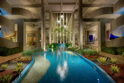 a swimming pool in the middle of a building at Elysium Resort & Spa in Faliraki