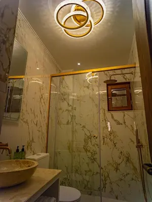 a bathroom with a shower and a sink at Fabrizio del Carretto in Rhodes Town