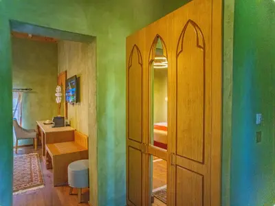 a room with a door and a room with a desk at Fabrizio del Carretto in Rhodes Town