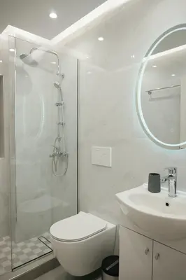 a bathroom with a toilet and a sink and a shower at Rhodes Central Studio by the sea in Rhodes Town