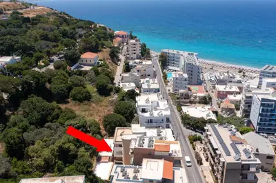 a red arrow is pointing to a city at Celestial City Suite in Rhodes Town