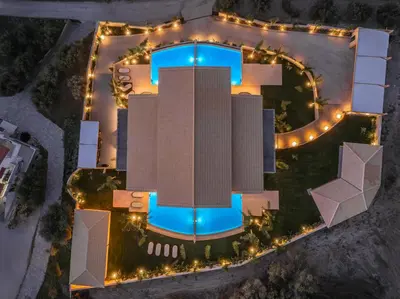 an overhead view of a building with lights at Costas Luxury Villas - Costa's Villa in Koskinou