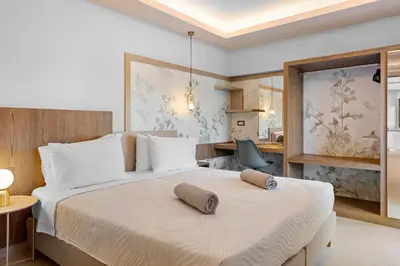 a bedroom with two beds with pillows on them at Casa De Sario in Rhodes Town