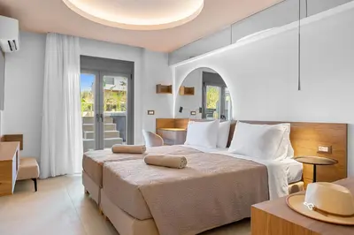 a bedroom with a large bed in a room at Casa De Sario in Rhodes Town