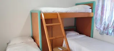 two bunk beds sitting next to each other in a room at Ioanna's Home in Émbonas